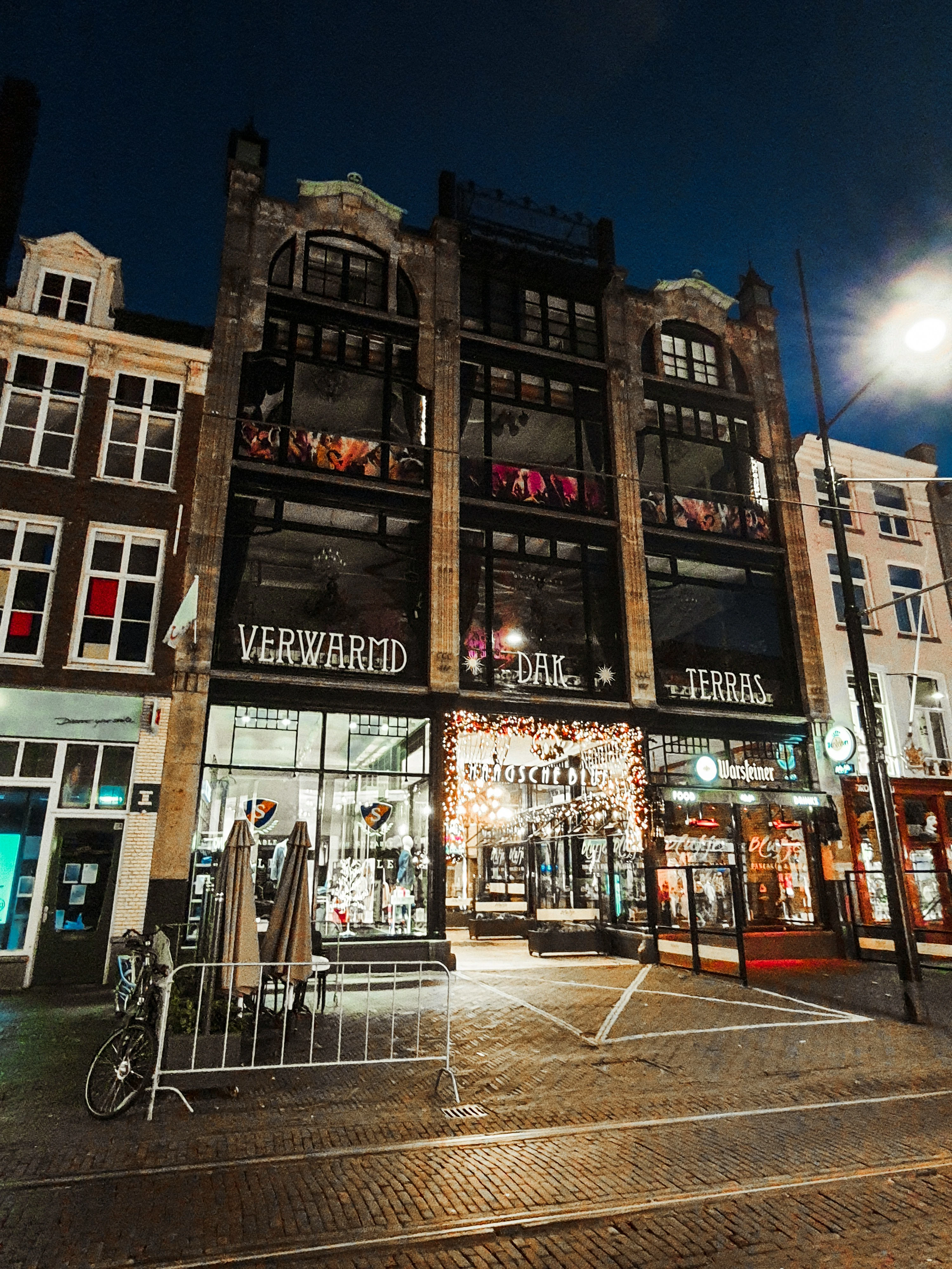 Historic building with large windows illuminated at night at Awards Night venue